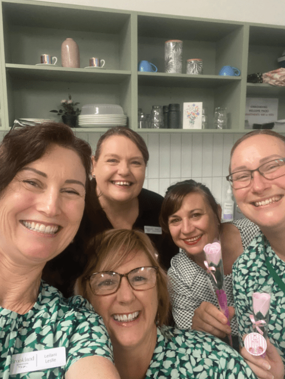 Brookland Robertson Café team members smiling on International Women's Day.